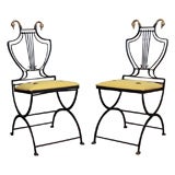 Paire de chaises pliantes néoclassiques montées en laiton