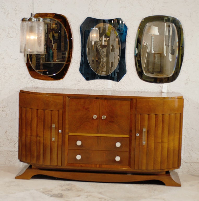 French Art Deco, scallop front sideboard in walnut veneer. Lemonwood inlay with mirrored metal knobs and clear acrylic handles. All original, beautiful! Original price $17,500.