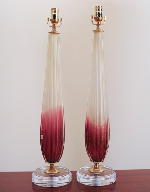 These became the signature line for Barovier & Toso back in the 1940's.  Deep cranberry and creamy vanilla inside teardrop shaped lamps, liberally sprinkled with gold dust.  So sublime - a must for a subtle, yet elegant, touch.  Original importer's