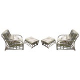 Pair of Rattan Arm Chairs with Matching Ottomans