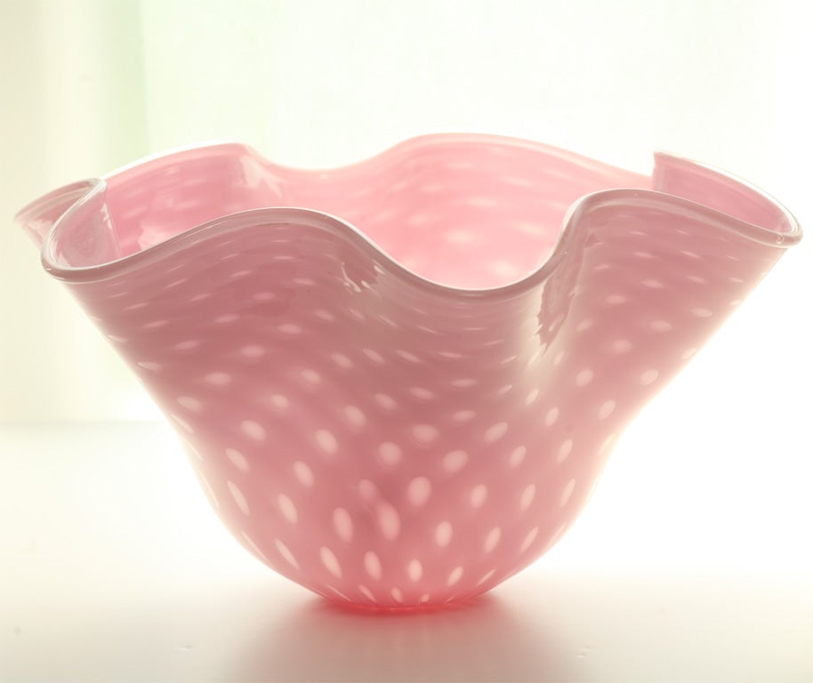 This fabulous large, handblown Murano pink cased light shade with controlled bubbles and undulating rim can be used either as a hanging shade or mounted upright. The controlled bubbles allow the light to shine through as small windows, creating a