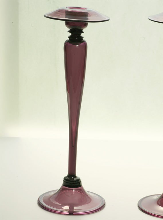 PAIR OF STEUBEN AMETHYST TALL CANDLESTICKS