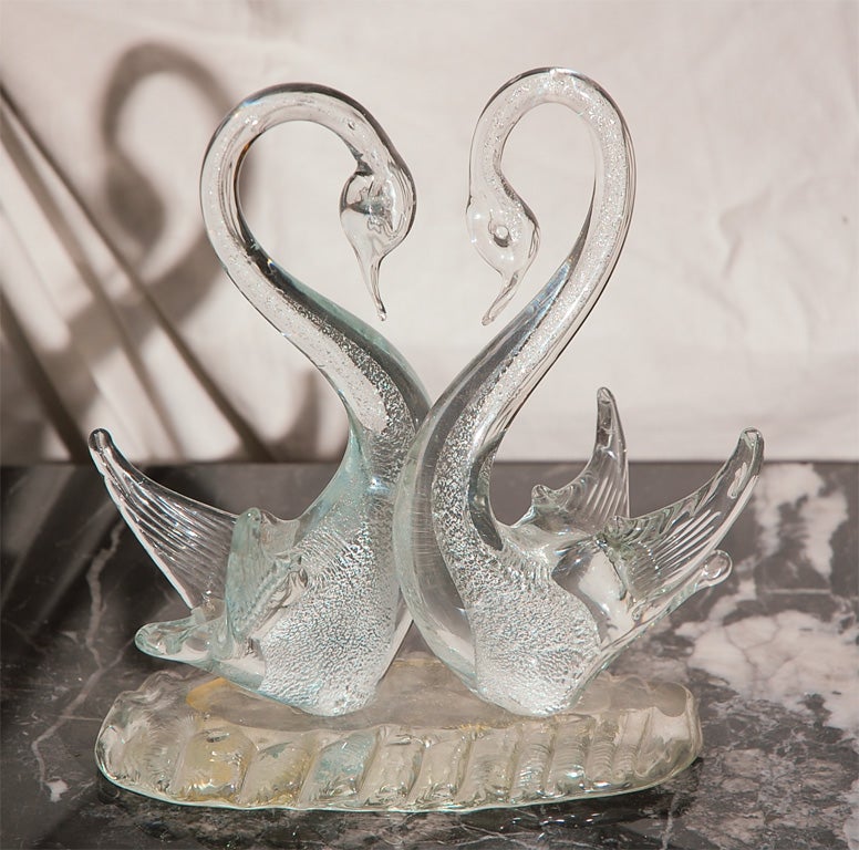 Pair of exquisite Murano swans on Murano glass base c. 1940's.