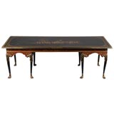 A PAINTED AND PARCEL GILT TABLE, BY DAVID ZORK DATED 1916