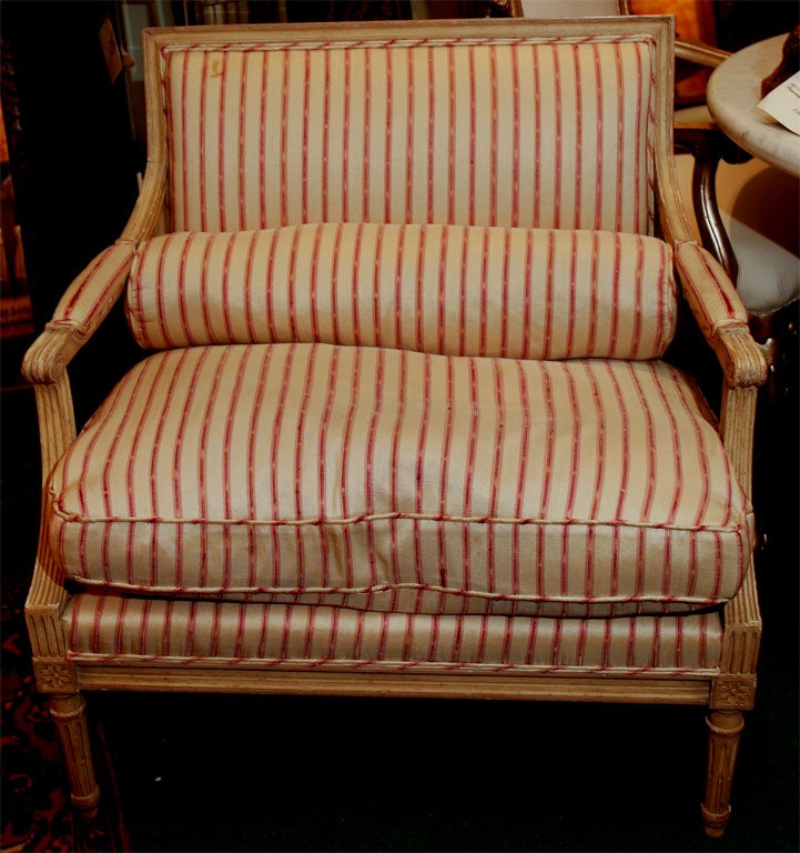 A LOUIS 16TH STYLE MARQUISE CHAIR WITH DOWN CUSHION AND KIDNEY PILLOW