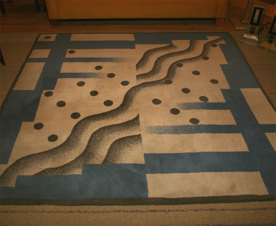 A butter- soft  wool rug with abstract patterning. Signed 