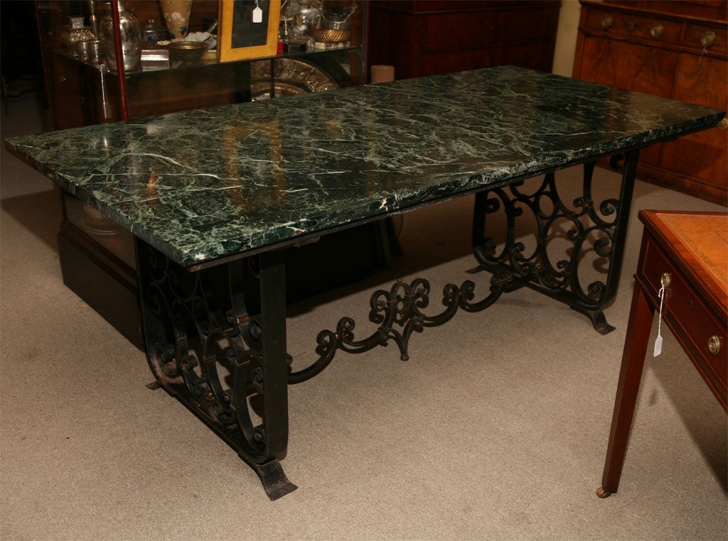 Marble-top table. French 1920s original green marble top and hand-forged iron base. Very good condition.