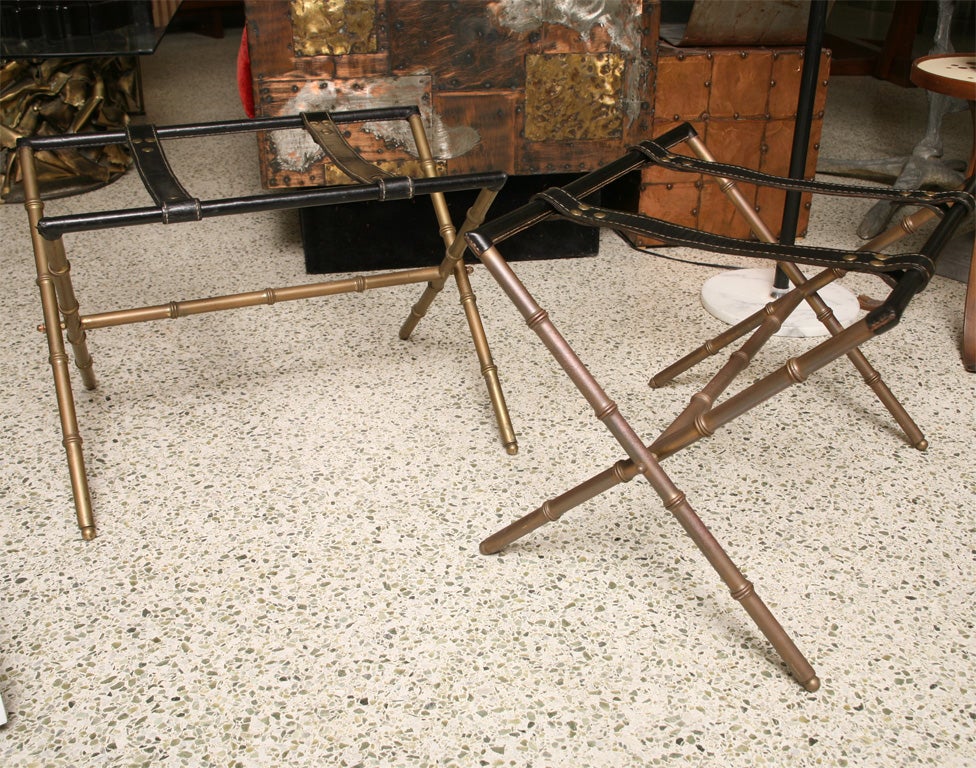 Pair of Adnet luggage racks<br />
Leather and Brass