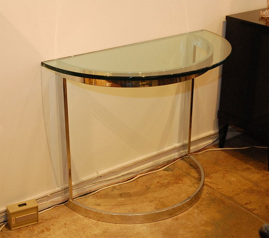 Pair of Chrome demilune console tables with 3/4