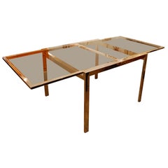 Sleek Chrome extendable Games table with smoked glass top