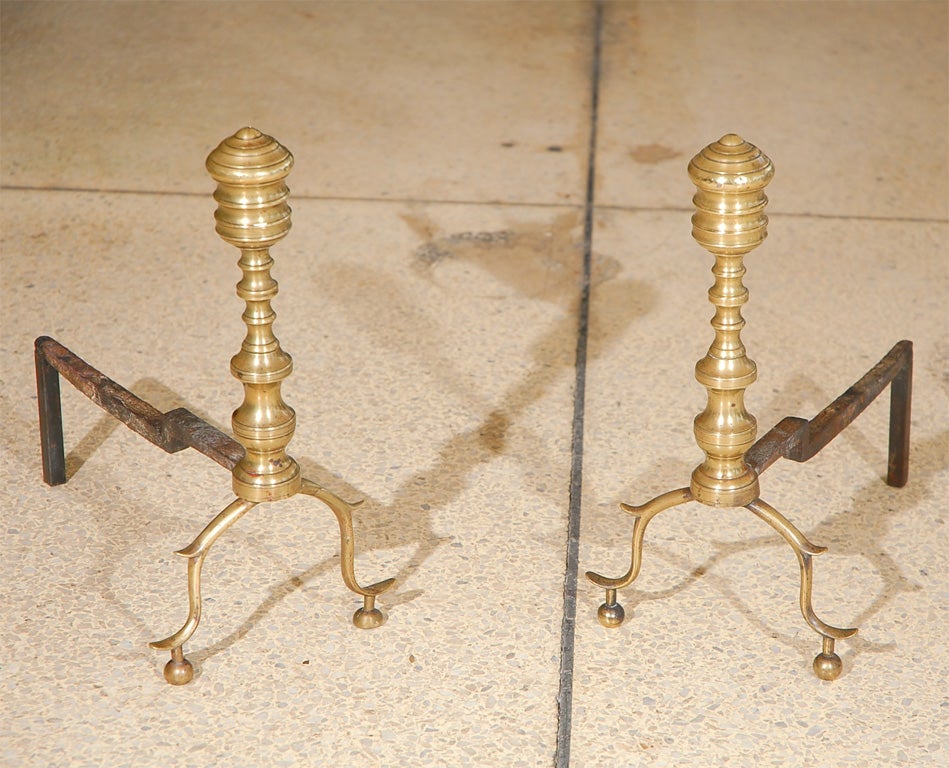 Charming brass fireplace andirons from the early 1800's.