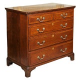 Antique English oak chest of drawers. Ivory escutcheons.