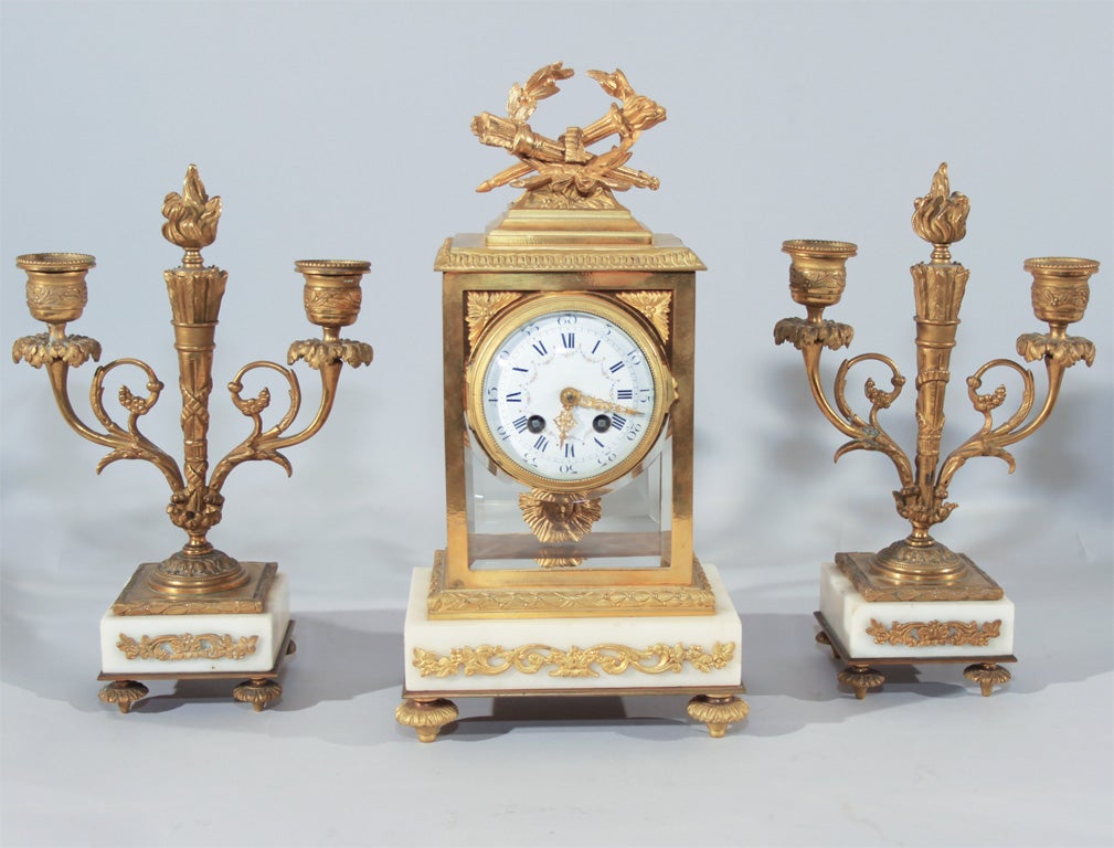 Three piece Clock and Candelabra set at 1stDibs