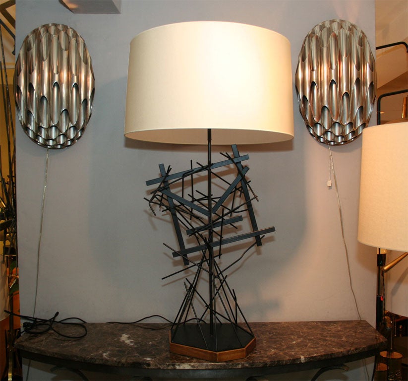 A pair of Italian sculptural table lamps.
Shades not included
