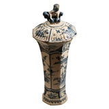 DUTCH DELFT BLUE AND WHITE OCTAGONAL VASE WITH COVER DUTCH DELFT BLUE AND WHITE OCTAGONAL VASE WITH COVER