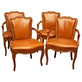 Four Louis XV-style leather upholstered fauteuils