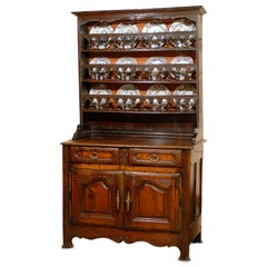 Antique 18th century Louis XV Vaisellier in Chestnut with Carved Designs, France