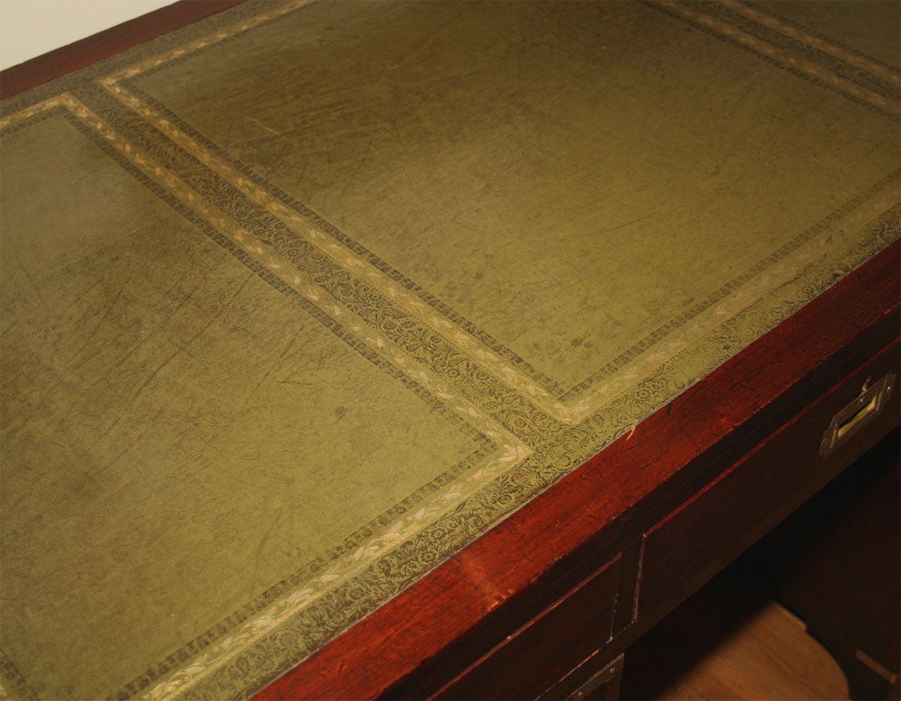 An English mahogany campaign style knee hole desk 3