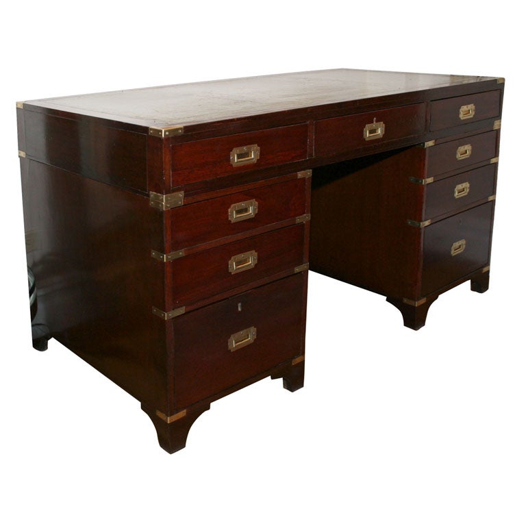 An English mahogany campaign style knee hole desk