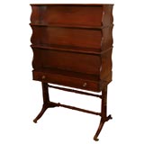 Antique An English Regency double-faced dwarf mahogany bookcase