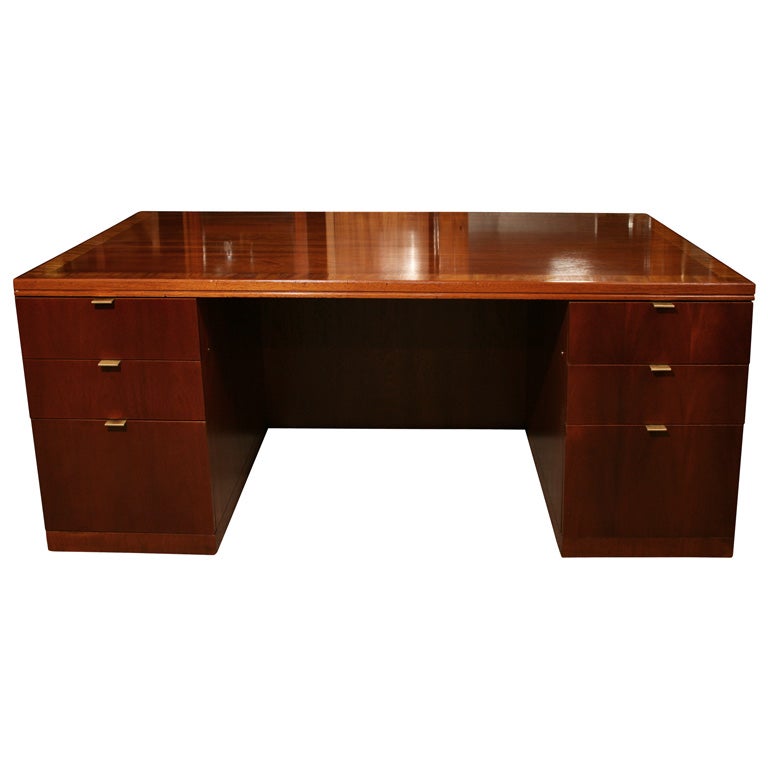 Large mohgany executive desk with brass plated handles. For Sale