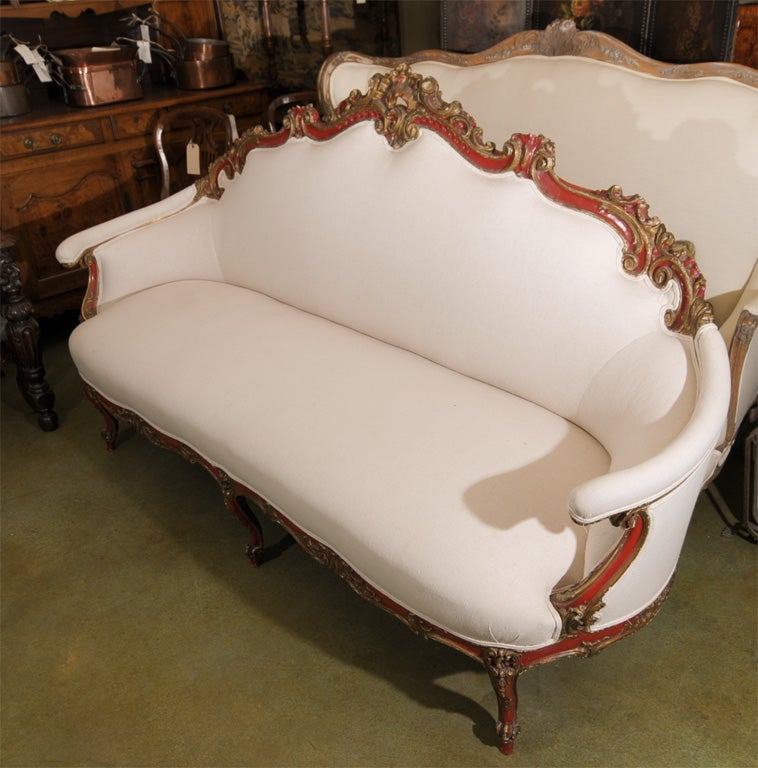 Gorgeous and unusual Antique Venetian painted sofa with gilt accents. Has great proportions, graceful arms and cabriole legs. This stunning antique Italian sofa needs new upholstery. Original price $14,750.00.

