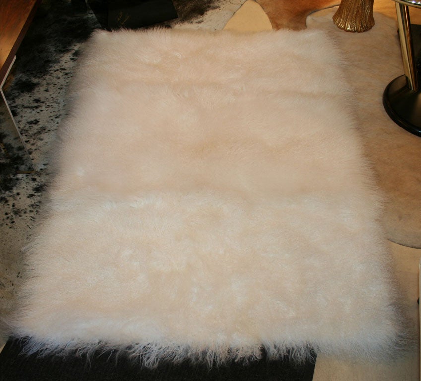 Mongolian fur rug. White, off white, brown, and black. Custom, $45 per sq. ft. 2 week delivery.