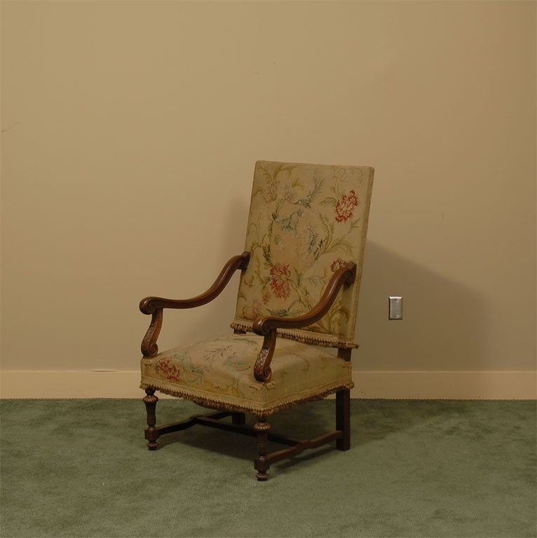 Exceptional large chair in walnut with period needlepoint fabric