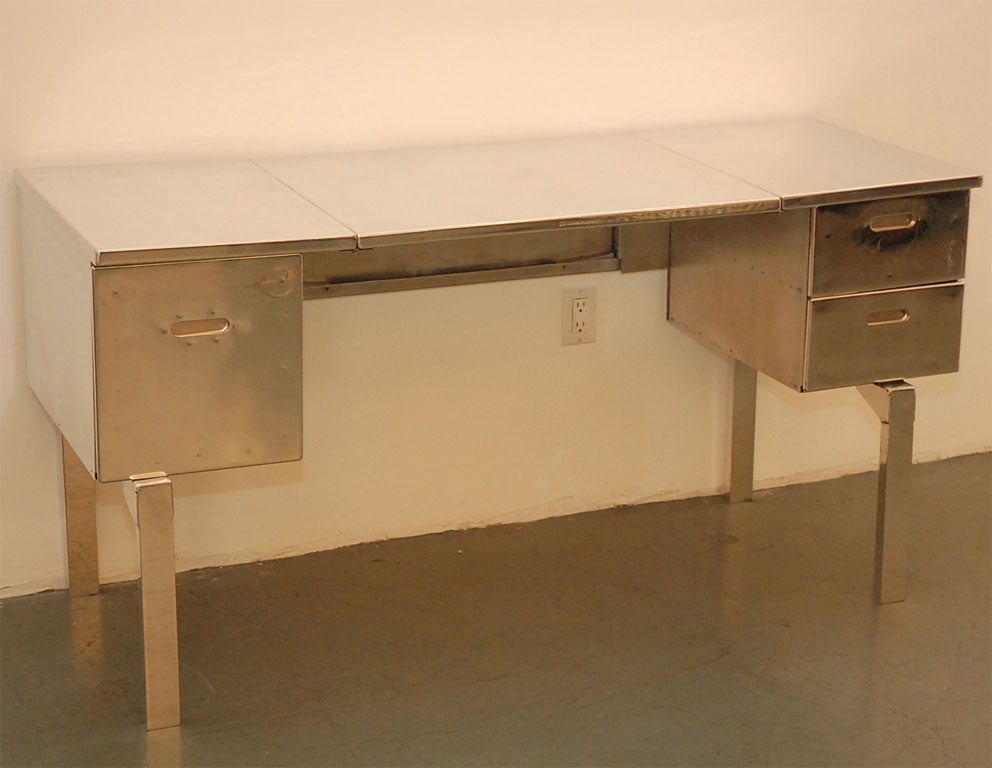 Aluminum campaign desk  professionally polished.   Perfect for writing desk  or  vanity.