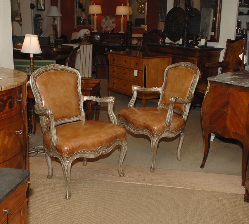 A pair of Venetian silver gilt armchairs, circa 1780