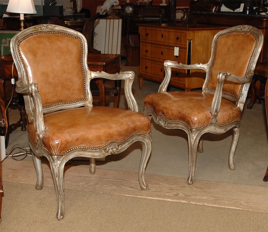Italian A pair of Venetian silver gilt armchairs