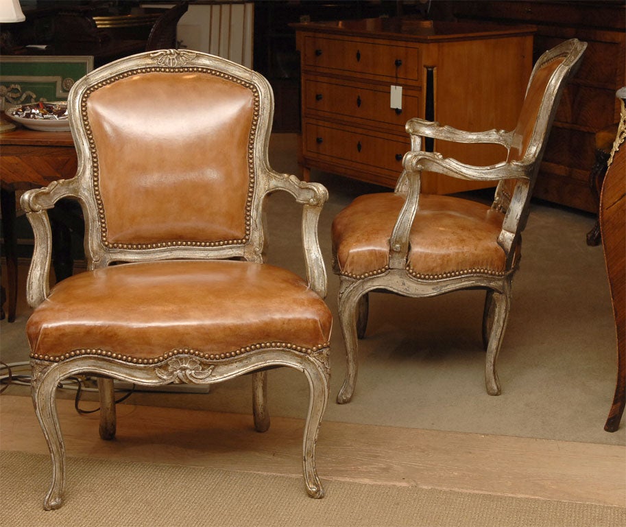 Wood A pair of Venetian silver gilt armchairs