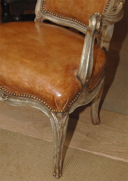 A pair of Venetian silver gilt armchairs 2