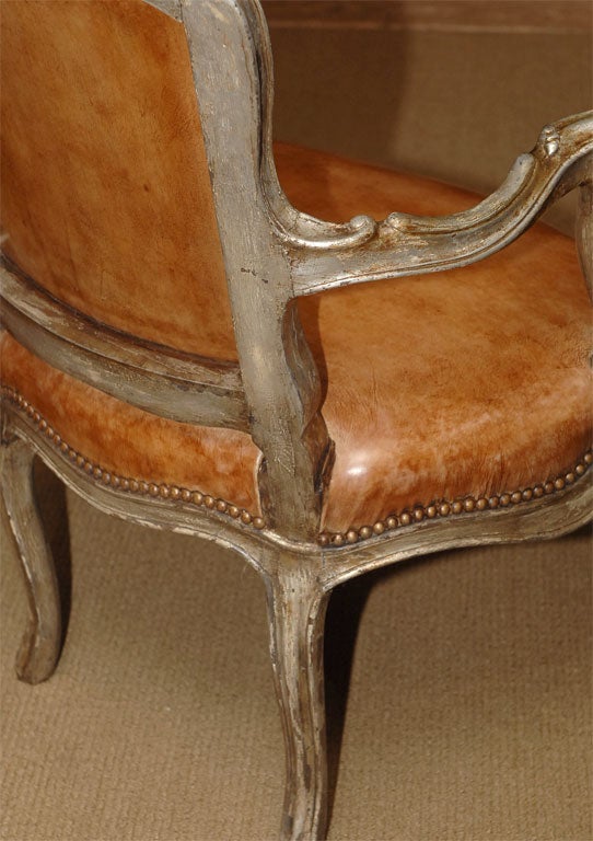 A pair of Venetian silver gilt armchairs 4