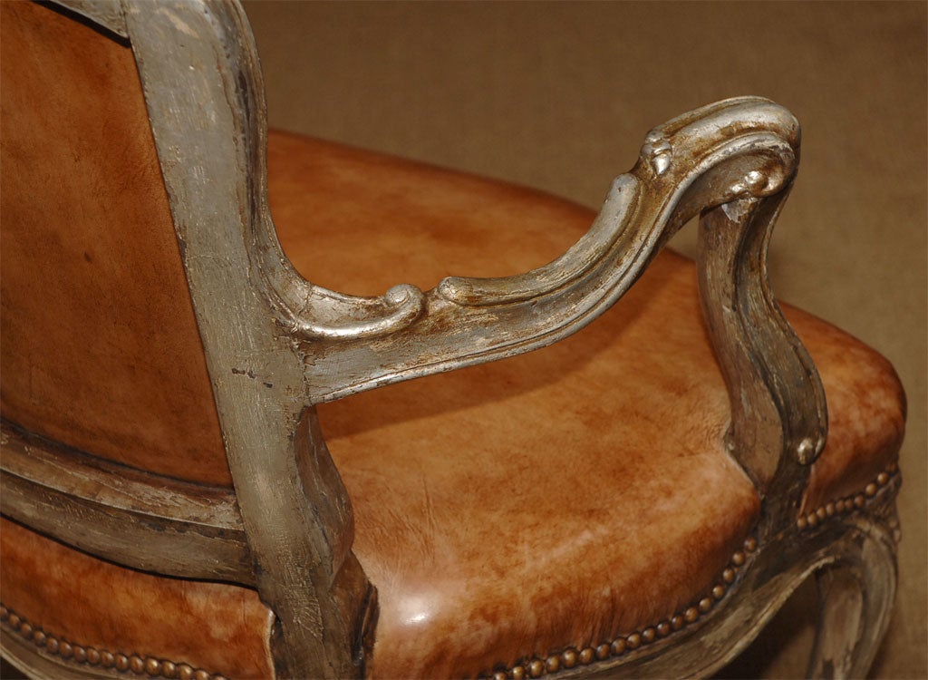 A pair of Venetian silver gilt armchairs 5