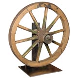 Antique Wagon Wheel on brushed Steel Stand