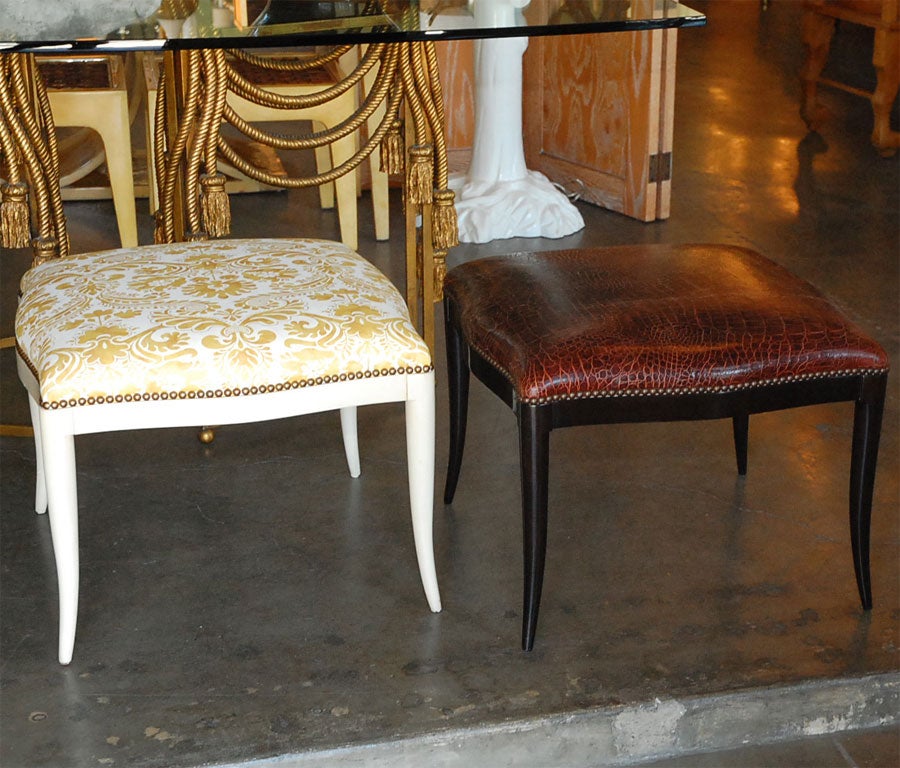 Paul Marra Design Klismos Ottoman. The one shown on the left in main photo is available and is in white antique painted finish with damask fabric. On the right the ottoman is shown in faux alligator leather with dark walnut finish.  These are also