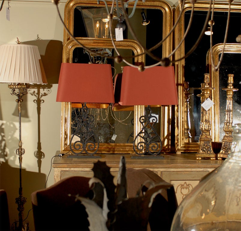 Pair of French iron architectural lamps