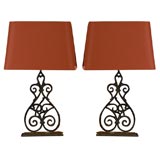 Pair of French iron architectural lamps