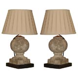 Pair of antique stone pediment lamps