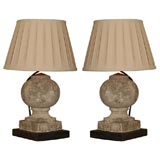 Pair of antique stone pediment lamps