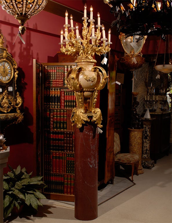 #CW2278  Unique newel post of gilt bronze and marble with 16 lights.