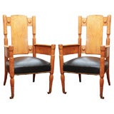 A Pair of English Arts & Crafts Oak and Leather Armchairs