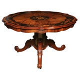 An English Antique Inlaid center table.