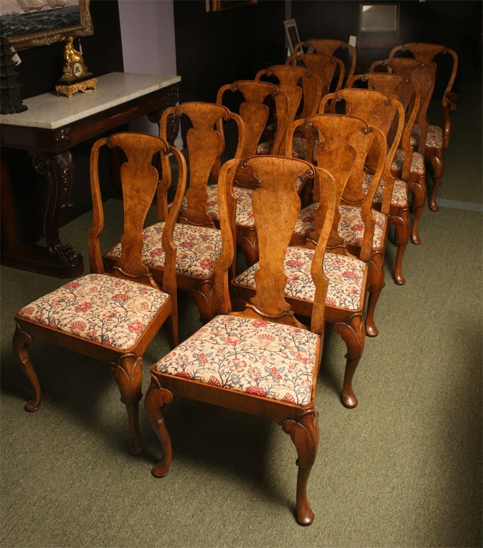 An impressive set of 12 English antique Queen Anne dining chairs
