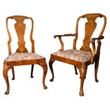 An impressive set of 12 English antique Queen Anne dining chairs