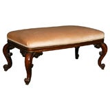An English Regency period footstool in Rosewood.