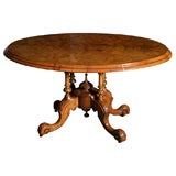 A mid-19th century English tilt - top Walnut Loo Table