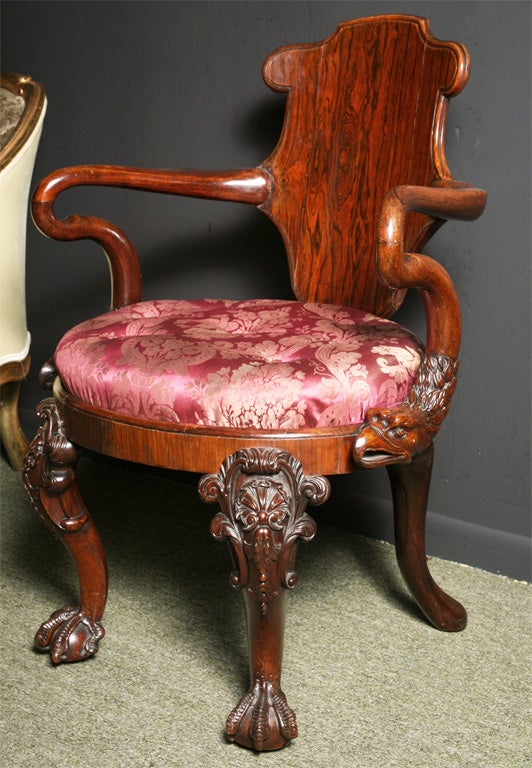 A magnificent pair of Rosewood Armchairs