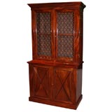 A Pair of Charles X Style Flame Mahogany Bookcases